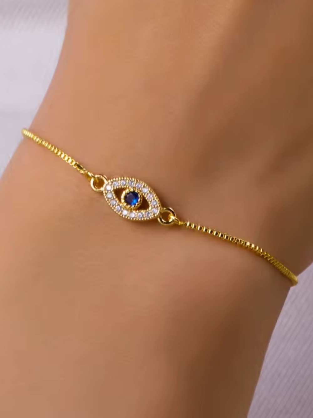 Gold Evil Eye Bracelet with Blue Center
